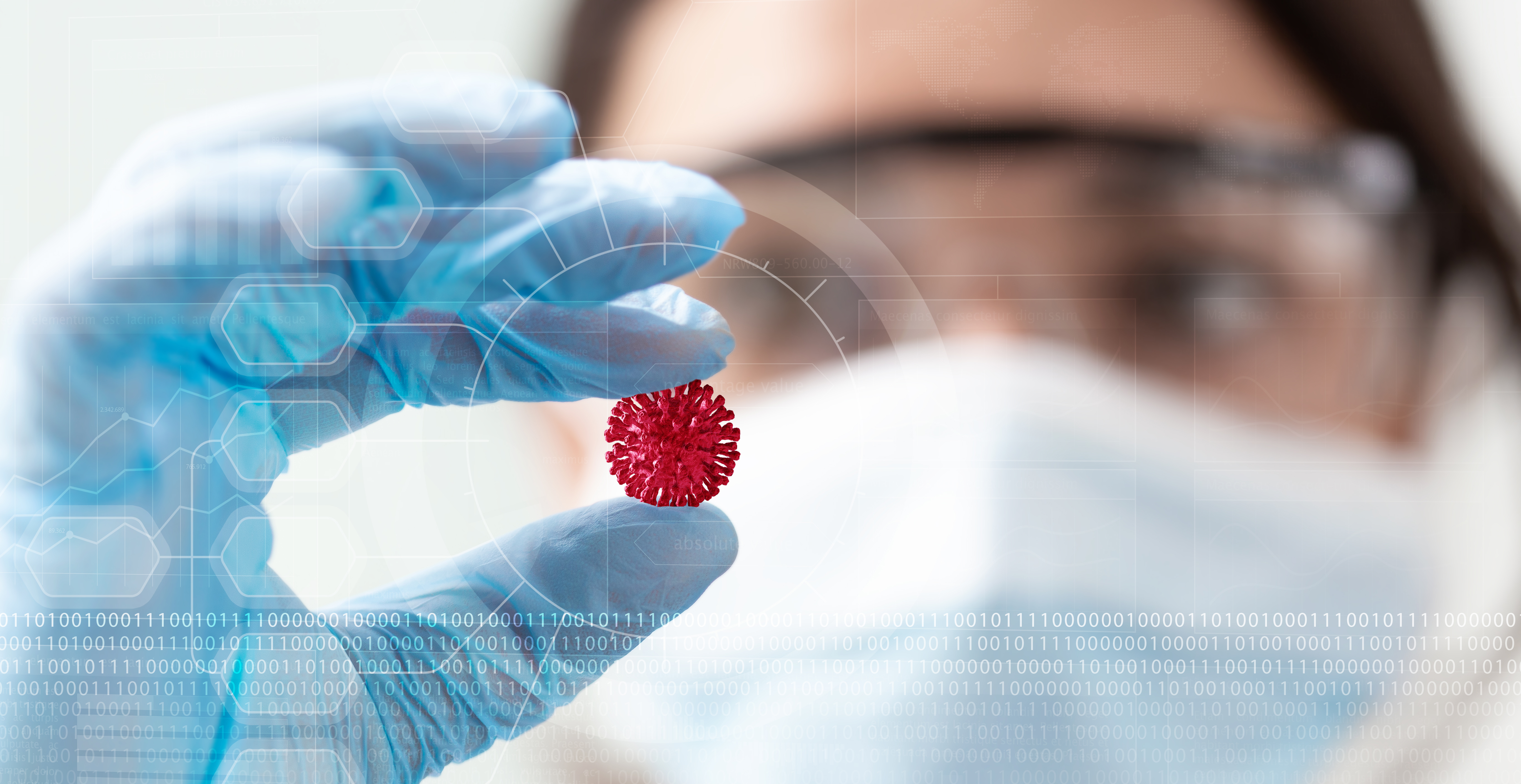 Professionista sanitario dotato di dispositivi di protezione individuale, che prende in mano il virus del SARS-CoV-2